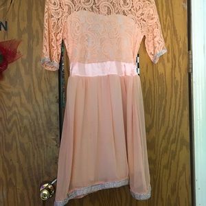 This dress was hand made for me , has size adjustments expands in the waste.
